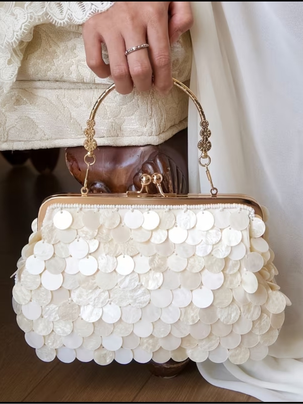 Elegant Cream Sequin Handbag with Gold Frame